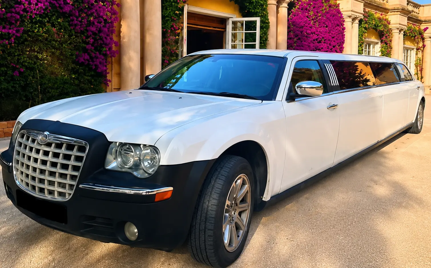 white Chrysler limousine Luxury white Chrysler limousine hire in Barcelona for weddings and special events